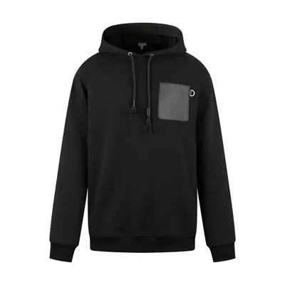 A plain black hoodie laid flat on white, drawstrings hanging and a small patch pocket on the chest